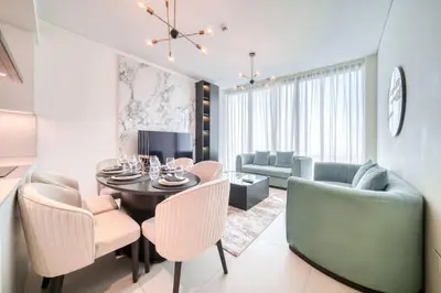a dining room with a table and chairs at Address JBR Marina View, Jumeirah Beach Residence, Dubai Marina - Mint Stay in Dubai