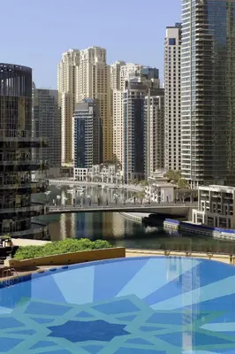 a view of a city from a pool in a city at Emaar Marina Residences - formerly Address Dubai Marina in Dubai