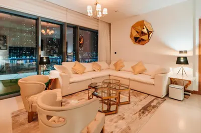 a living room with a couch and a table at Vida Dubai Marina & Yacht Club, Hotel and Residences, Luxurious 2BR in Dubai