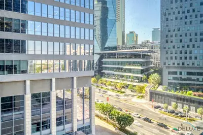 an aerial view of a city with tall buildings at Limited Time Offer Stylish 1BR near to Metro by Deluxe Holiday Homes in Dubai