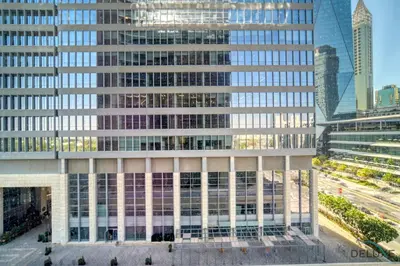 an aerial view of a tall building with many windows at Limited Time Offer Stylish 1BR near to Metro by Deluxe Holiday Homes in Dubai