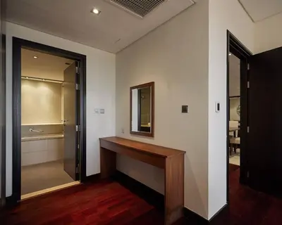 a room with a counter and a mirror on the wall at Authentic 2 bdr in Anantara Resort Palm Jumeirah in Dubai