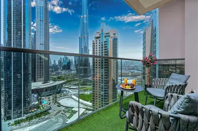 a balcony with a view of the city at Spacious and Overlooking Burj & Fountains in Dubai