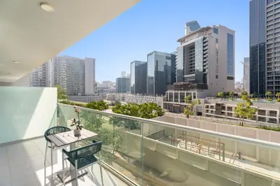 a balcony with a view of a city at Aliving Exclusive 1BR Reva Residence Business Bay-218 in Dubai