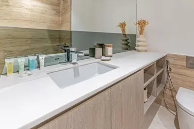 a bathroom with a sink and a toilet at Urban Elegance new studio near Dubai Mall & Burj in Dubai