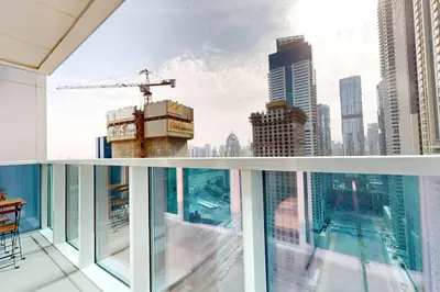 a balcony with a view of a city at Marina Arcade - Neat Two Bedroom in Dubai
