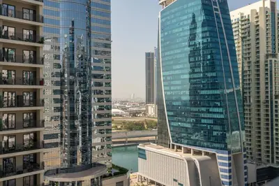a view of a city with tall buildings at The View 1 Bedroom in Dubai