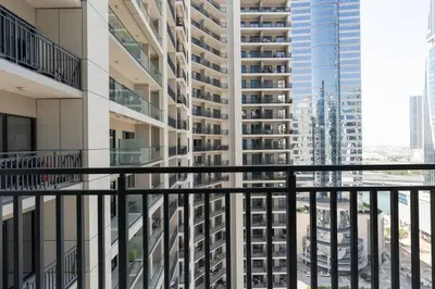 a balcony with a view of tall buildings at The View 1 Bedroom in Dubai