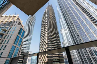 a view of skyscrapers in a city at Burj Khalifa Views / 5 min walk from Dubai Mall / Dubai Opera / Upgraded / Designer Choice / 8 people / The Best Location in Dubai
