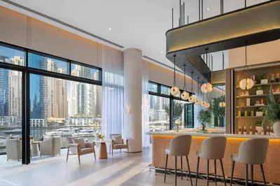 a hotel lobby with a view of the city at Vida Residences Dubai Marina by Emaar in Dubai