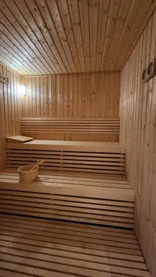 a large wooden sauna with two beds in it at STAY BY LATINEM Luxury 1BR Holiday Home CVR B2704 near Burj Khalifa in Dubai