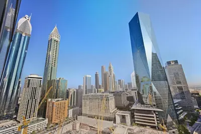 a view of a city skyline with tall buildings at Difc 1 Bd apartment in Park Tower in Dubai