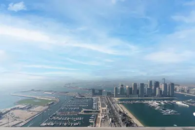 an aerial view of a city and a harbor at Lux BnB Princess Tower Palm Ocean Views in Dubai