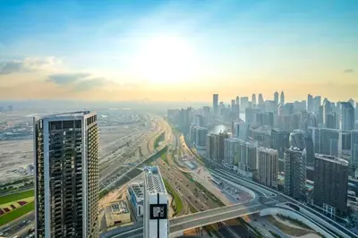 an aerial view of a large city with many tall buildings at Paramount Towers - Elegant Home in Dubai