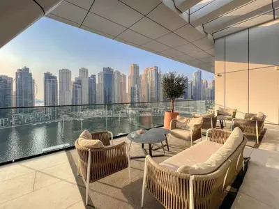 a balcony with a view of a city skyline at GuestReady - Opulent Residence in Dubai Marina in Dubai