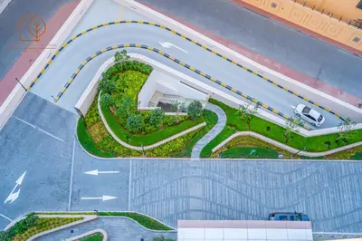an overhead view of a building with a garden at Amazing One Bedroom Apartment in Downtown Dubai 167FO2-1 in Dubai