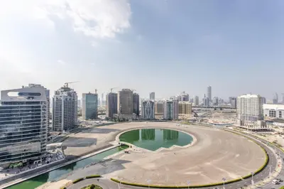 an aerial view of a city with tall buildings at Frank Porter - Elite 5 Sports Residence in Dubai