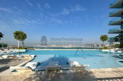 an image of a swimming pool in a building at StoneTree - New Luxury Apartment with Private Beach in Dubai