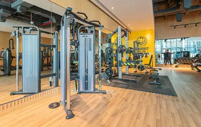 a gym with a lot of equipment in a room at Luxury Studio, Seven Palm Residence-Palm Jumeirah in Dubai