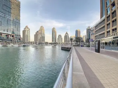 a view of a river in a city with buildings at Iris Blue - Neat One Bedroom in Dubai