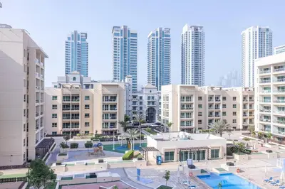 an aerial view of a city with tall buildings at Serene & Spacious 1BR The Greens in Dubai