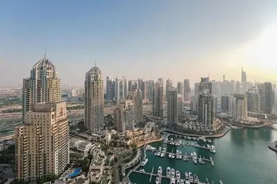 an aerial view of a city with a harbor at Luxe Living: Spacious Waterfront 2BR in Marina Gate in Dubai