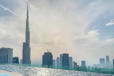 a view of a city skyline from a swimming pool at Frank Porter - Paramount in Dubai