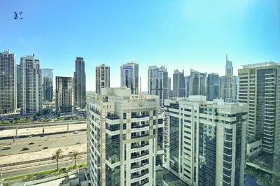 a view of a large city with tall buildings at Luxury Escapes - Budget 1BR Apt in Marina - Near Tram & Metro -Time Place Tower in Dubai