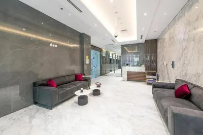 a large living room with two couches and a table at 3 Minutes to Dubai Mall! DVR Vacation Homes in Dubai