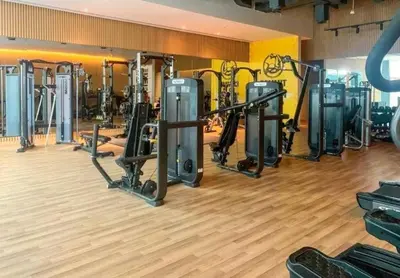 a gym with a bunch of equipment in a room at Fully-equipped studio Palm Jumeirah, Seven in Dubai