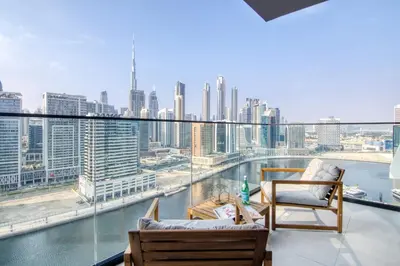 a balcony with a view of a city skyline at The Smart Concierge - Binghatti Canal in Dubai
