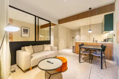 a living room with a couch and a table at FAM Living - Upside Living - WFH Friendly-Business Bay in Dubai