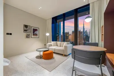 a living room with a view of a city at FAM Living - Upside Living - WFH Friendly-Business Bay in Dubai