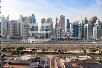 a view of a large city with tall buildings at 1 Bedroom Apartment in JLT in Dubai