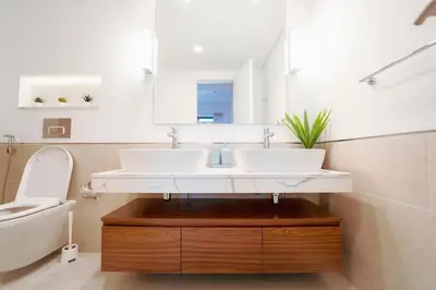a bathroom with a sink and a toilet at Spectacular 2BR Apartment Full BurjAlArab View in Dubai