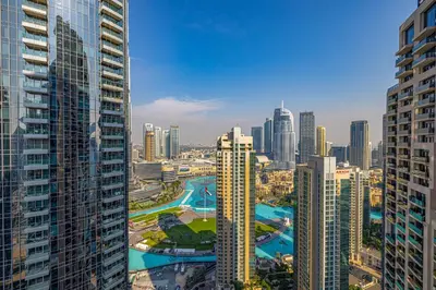 an aerial view of a city with tall buildings at Daniels 3BR Urban Retreat with Downtown Views in Dubai