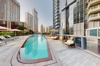 a swimming pool on top of a building at WhiteSage - Opera Grand Elegance 3BR with Burj Khalifa Views in Dubai