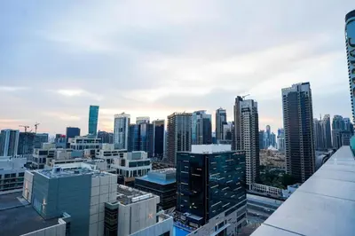a view of a city skyline with tall buildings at Luxury Hotel Apartment - DownTown in Dubai