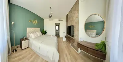 a bedroom with a large bed and a mirror at LUXURY SPACIOUS - 1 BR - SKY GARDENS DIFC - Heart of Trade Centre and Dubai Mall in Dubai