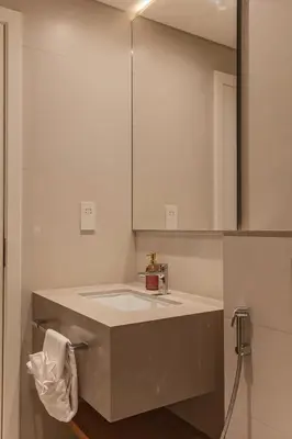 a bathroom with a sink and a mirror at La Vie, JBR private beach, private parking and pool in Dubai