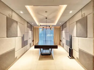 a dining room with a table and a window at GuestReady - Above the clouds at Opera Grand in Dubai