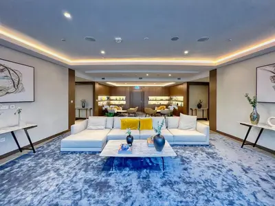 a living room with a couch and a table at GuestReady - Above the clouds at Opera Grand in Dubai