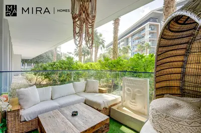 a living room with a couch and a table at Mira Holiday Homes - Luxury 1 bedroom in Bluewaters Island in Dubai