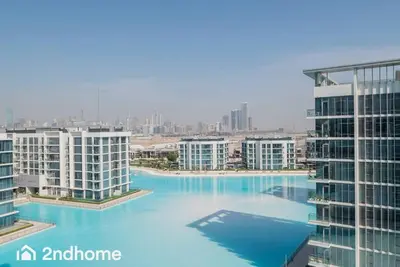a view of a large body of water with buildings at 2ndHome - District One Residences , Residence 14 in Dubai