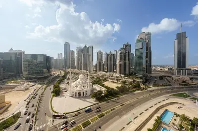 a view of a city with tall buildings at Discover unmatched Comfort in Downtown Dubai in Dubai