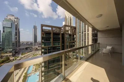 a balcony with a view of the city at Discover unmatched Comfort in Downtown Dubai in Dubai