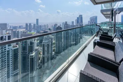a view of a city from the observation deck of a skyscraper at Stylish 2BR Retreat Wi-Fi & Pool Access in Dubai