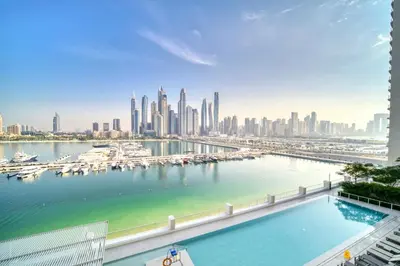 a view of a harbor with boats in the water at Seaside Splendor: Luxe Retreat at Emaar Beachfront in Dubai
