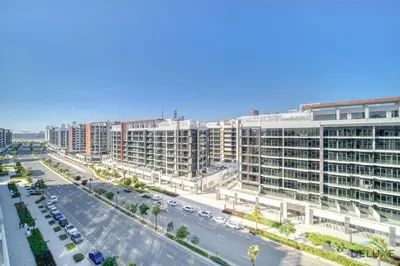 an aerial view of a city street with buildings at Sizeable 1BR at Azizi Riviera 35, Al Merkadh by Deluxe Holiday Homes in Dubai