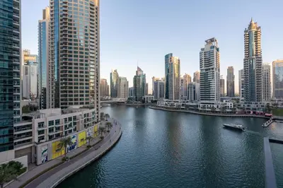 a view of a river in a city with tall buildings at LIV Residence - Luxurious 2BR - Dubai Marina View - Marina Walk in Dubai